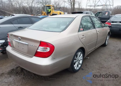 2002 Toyota Camry Le from USA, damaged, VIN 4T1BE32K72U073996